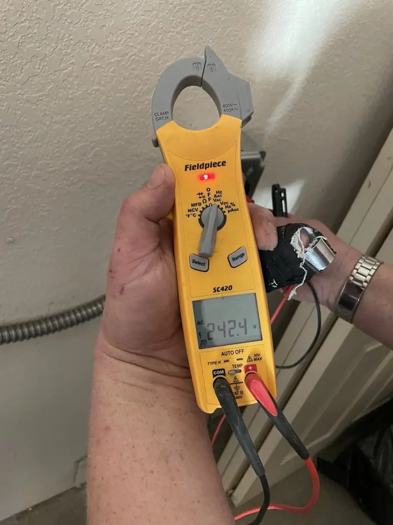 Voltage testing with clamp meter during Generator Installation in Cohasset